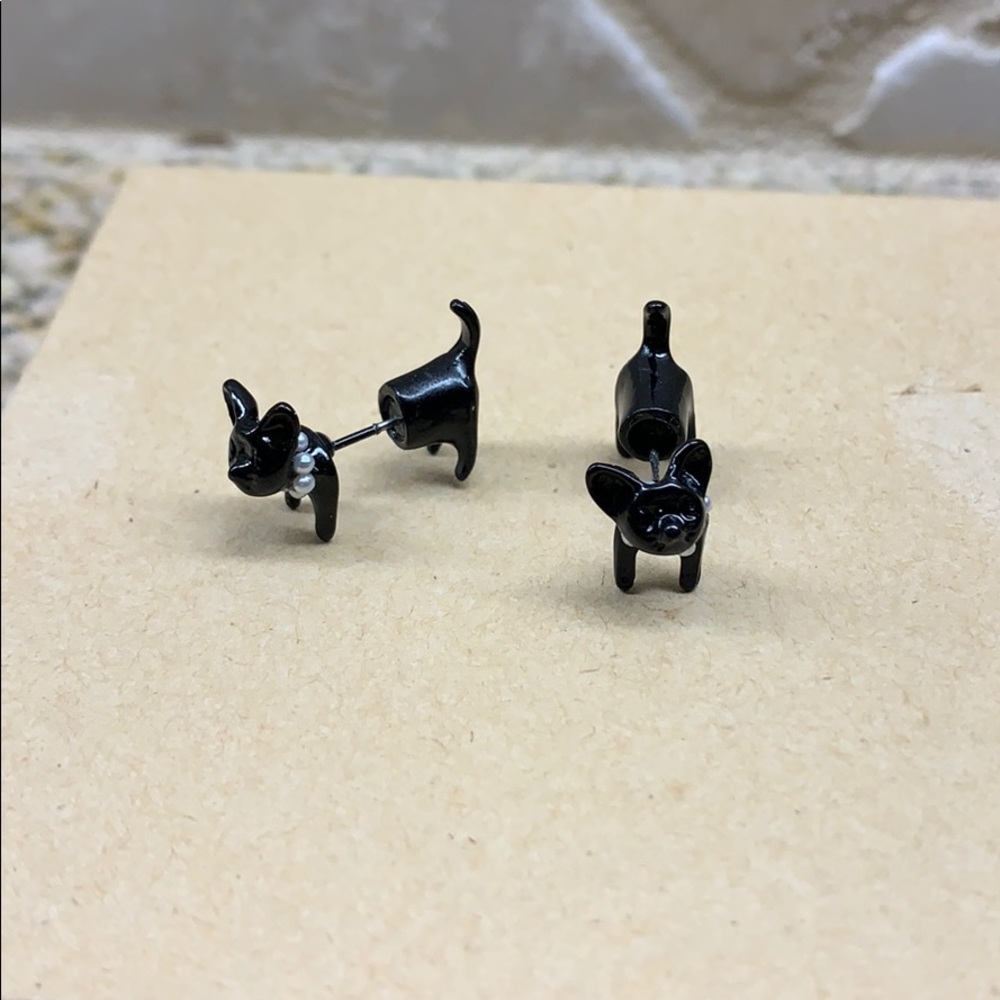 Brand new!. Black metal double end dog earrings
